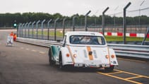 Morgan Plus Four racecar in pitlane