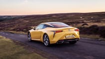 Lexus LC500 coupe yellow driving