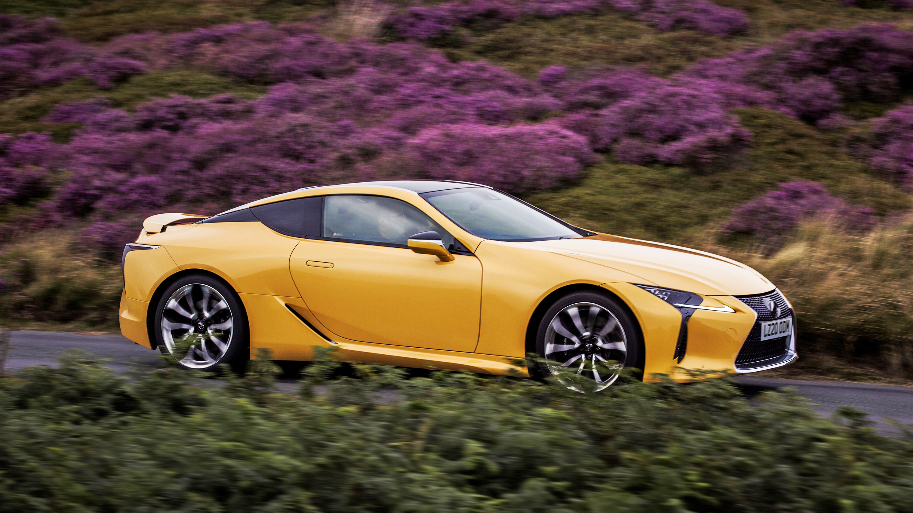 Lexus LC500 coupe yellow side profile