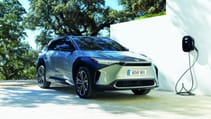 Toyota bZ4X electric car plugged in to charge