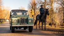 Everrati's Land Rover Series IIA next to a horse