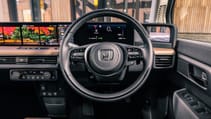 Honda e interior steering wheel