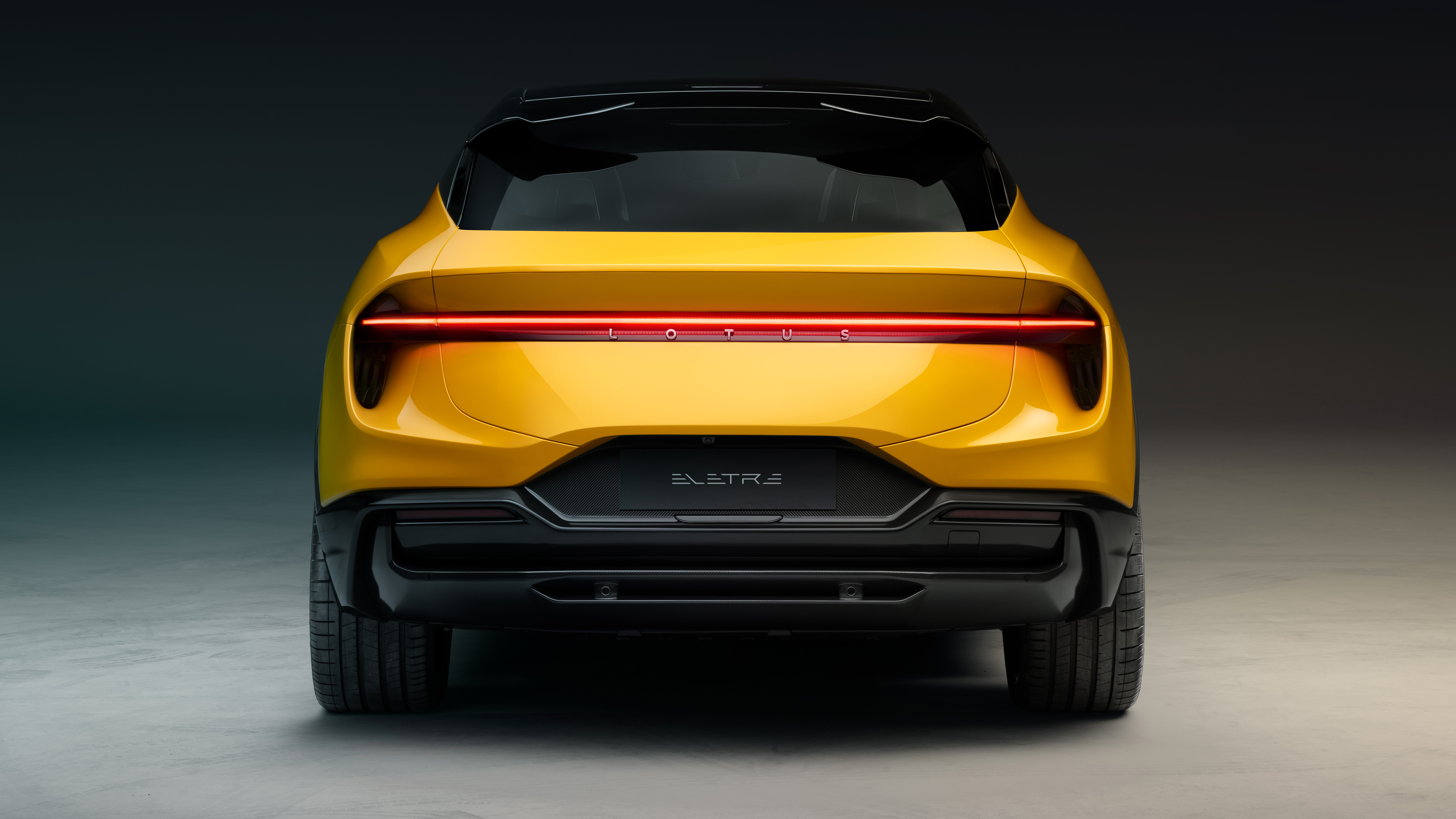 08_Lotus_Eletre_Yellow_Studio_Rear.jpg