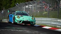 Nürburgring 24 Hours Falken Porsche jumping a crest