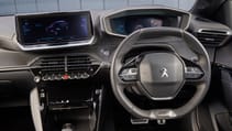 Peugeot e-208 interior steering wheel detail