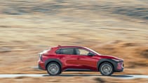 Toyota bZ4X SUV dynamic side view