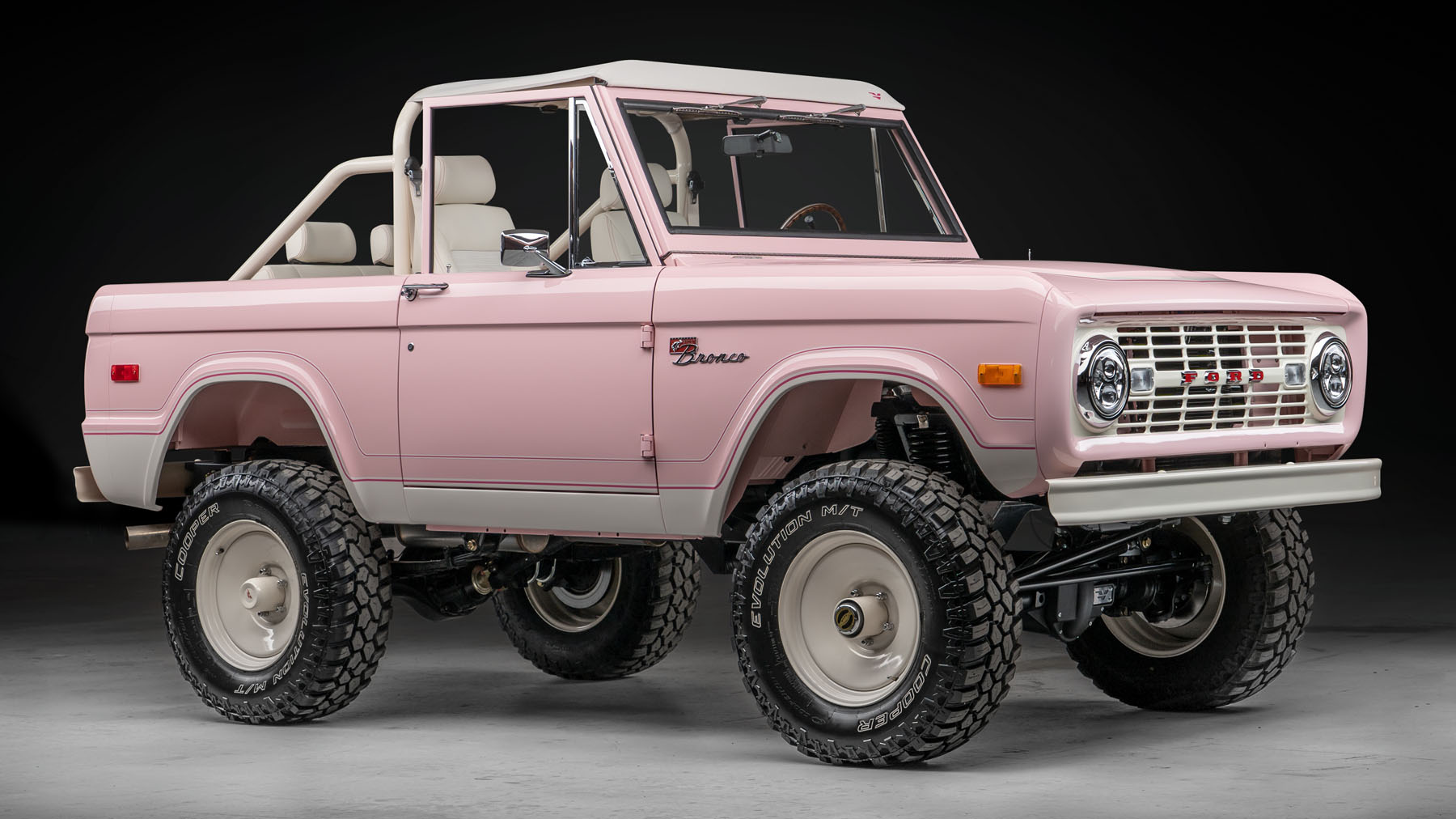 This is a 454bhp classic Ford Bronco in a very cool shade of pink