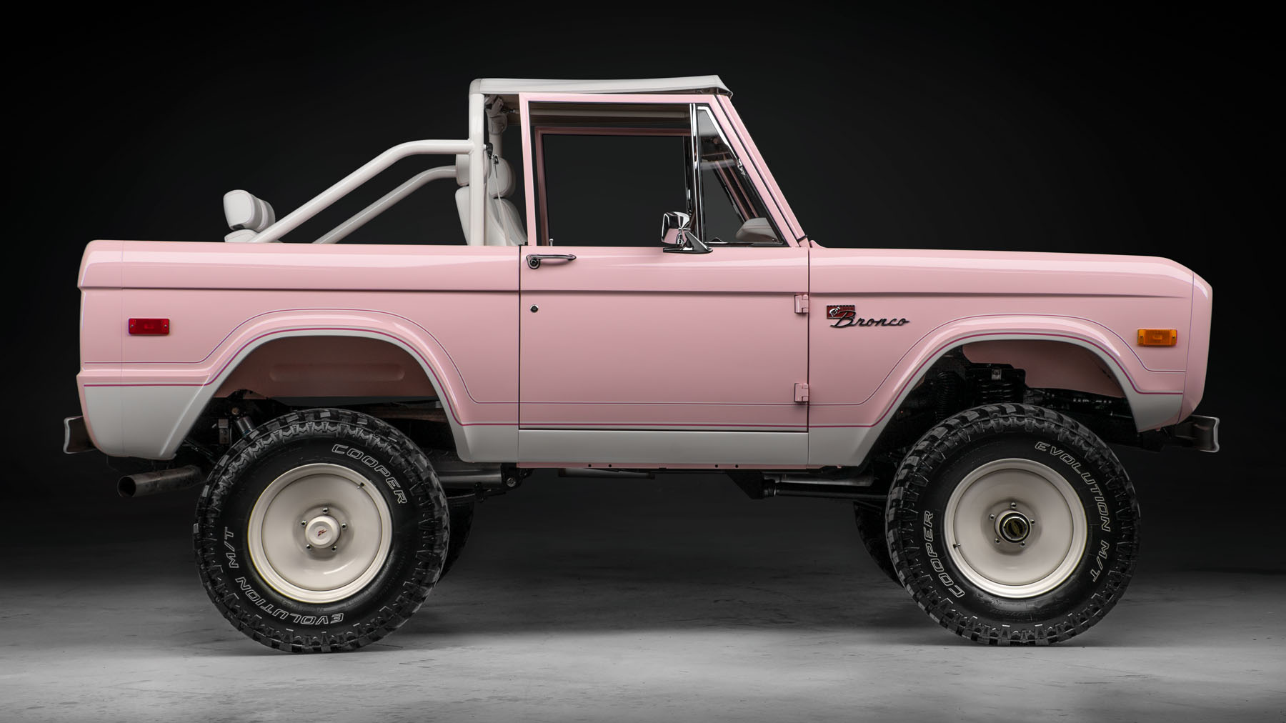 This is a 454bhp classic Ford Bronco in a very cool shade of pink