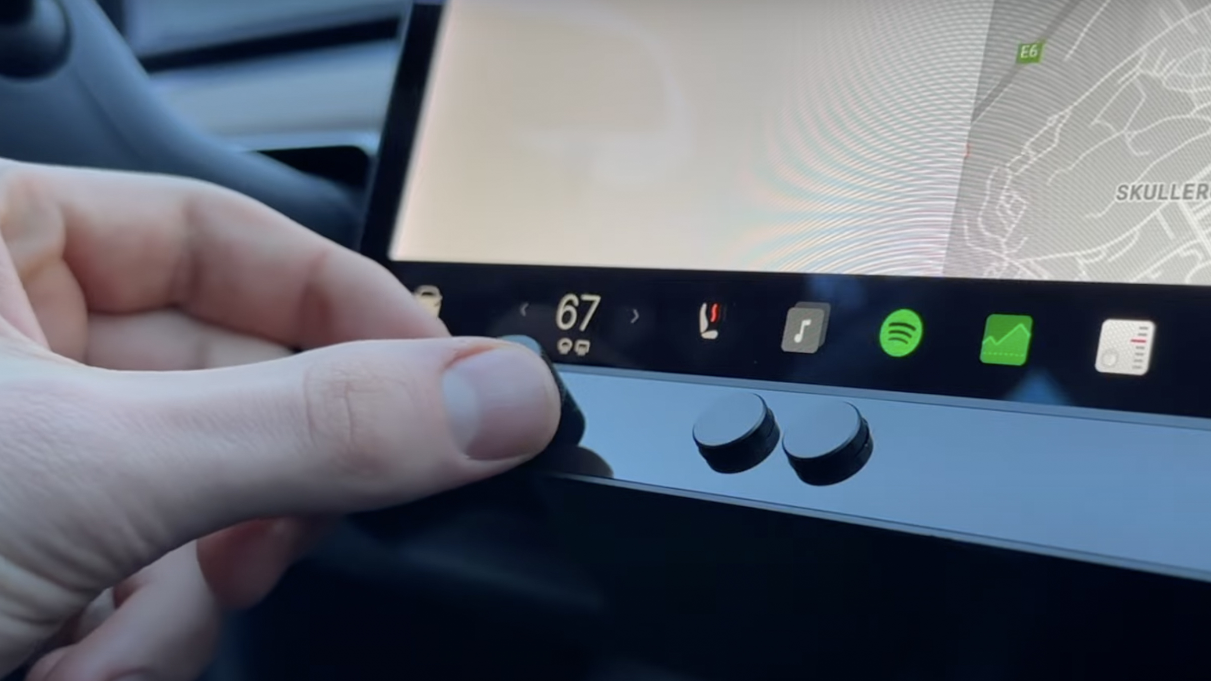 This aftermarket mod adds actual buttons to your Tesla's interior