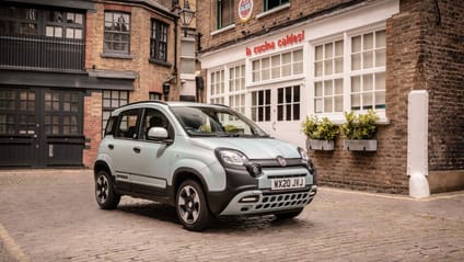 Static shot of Fiat Panda 4x4 in courtyard of mews