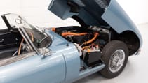 Static shot of Jag E-type with hood up