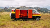 A 1977 Dodge Tradesman parked up camper