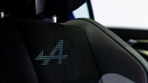 Close-up studio shot of Renault Rafael - alpine trim seat headrest illumination