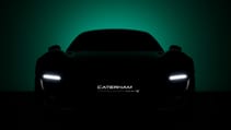 Shadowy teaser of Caterham's Project V with headlights and numberplate illuminated