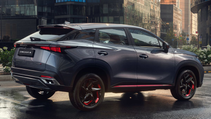 Omoda 5 in static shot on street, from rear side profile view