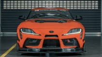 Static garage shot of Toyota GR Supra GT4 100 Edition, front dead on