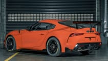 Static garage shot of Toyota GR Supra GT4 100 Edition, rear