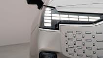 Static shot of the Volvo EM90, front headlight close-up