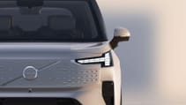 Dead on zoomed shot of front end of Volvo EM90
