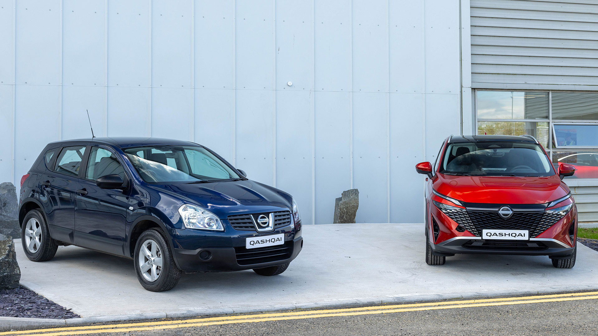 The new Qashqai sitting alongside the first gen Qashqai