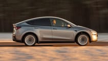 Tesla Model Y profile Tom Ford driving