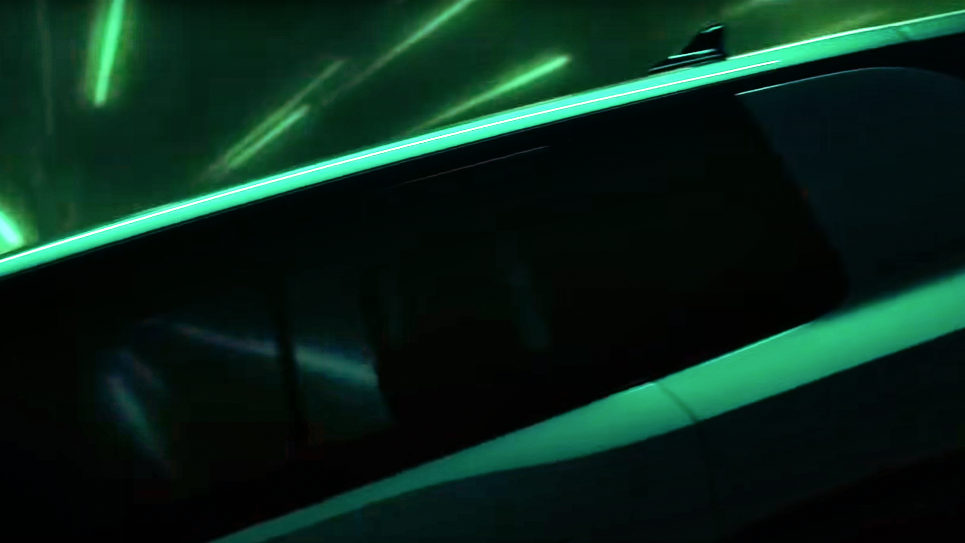 A shadowed teaser image of Skoda Vision 7S, from side on an angle