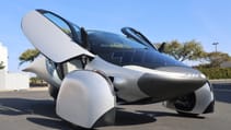 Static front three-quarter shot of Aptera with doors open