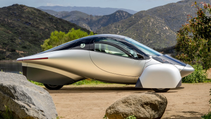 Side shot of Aptera solar car with mountainous backdrop