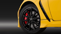 Close up exterior shot of Toyota GR86 Yuzu Edition Brembo brake caliper and wheels