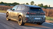 BMW iX3 prototype exterior rear three quarter dynamic