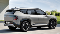 Static shot of Kia EV5 base trim, high angled three quarter rear