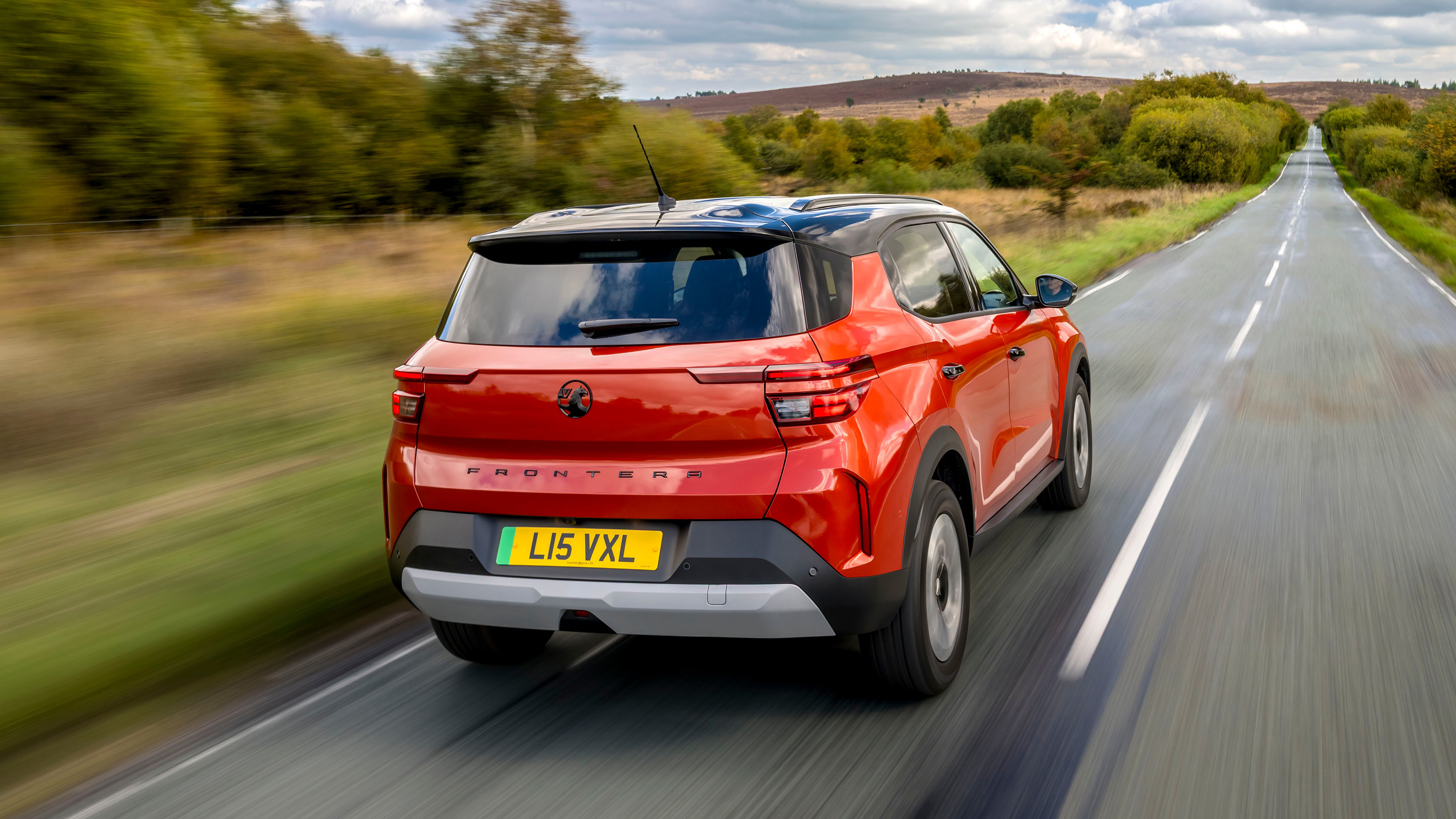 Vauxhall Frontera Electric orange rear driving