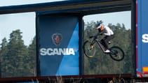 Red Bull Scania moving trucks stunt bike jump