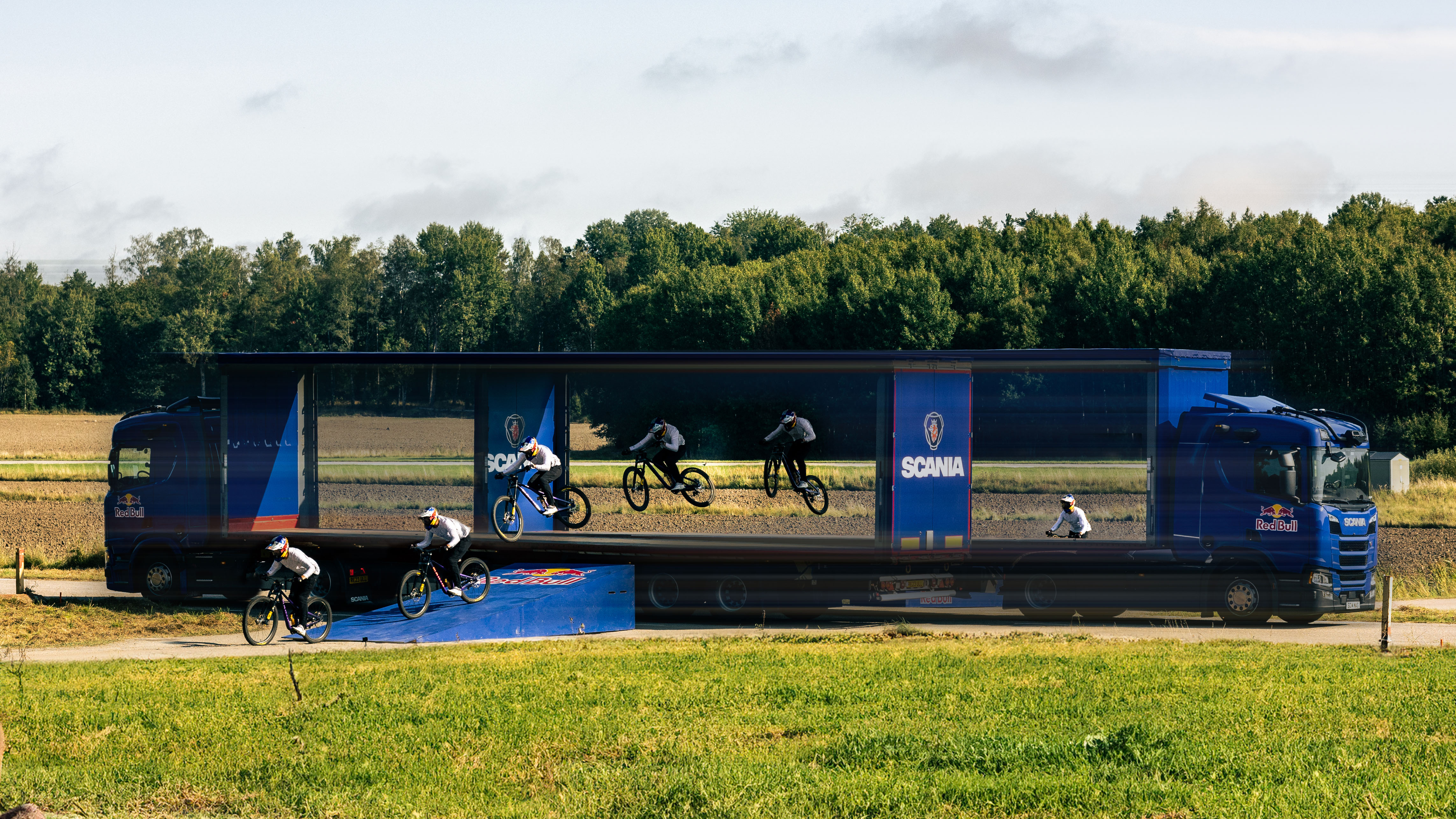 Red Bull Scania moving trucks stunt bike jump