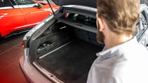 A man looking into the boot of an Audi RS