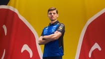 Max Verstappen pictured against Red Bulll background
