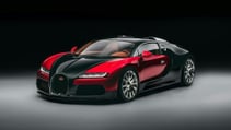 Bugatti Veyron on a grey floor against a black studio background