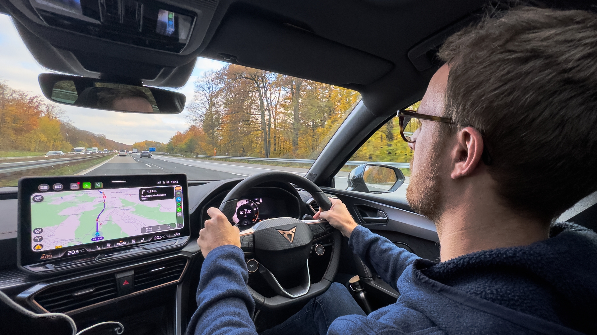 Driver with hands on the wheel of Cupra Leon Estate VZ1