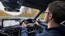 Driver with hands on the wheel of Cupra Leon Estate VZ1