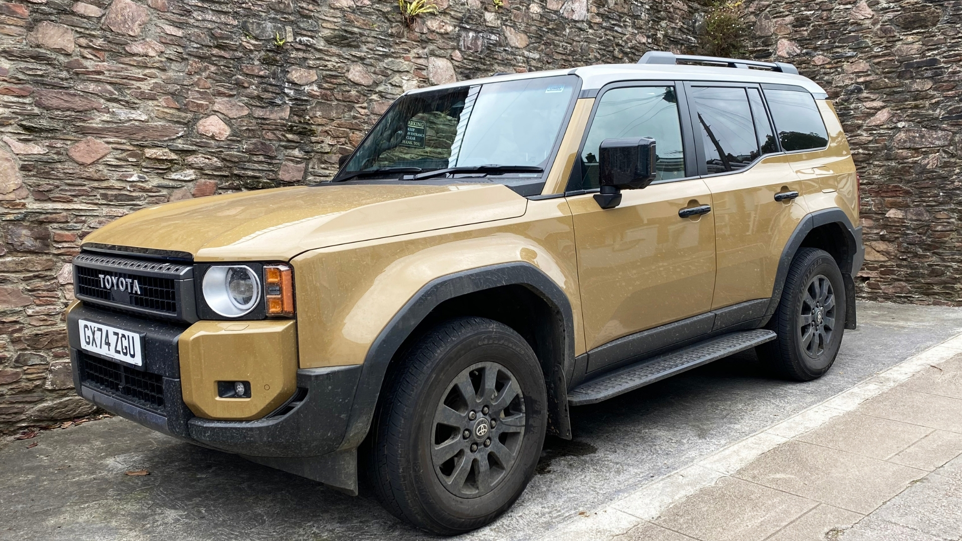 Land Cruiser parked outside, pictured from the side