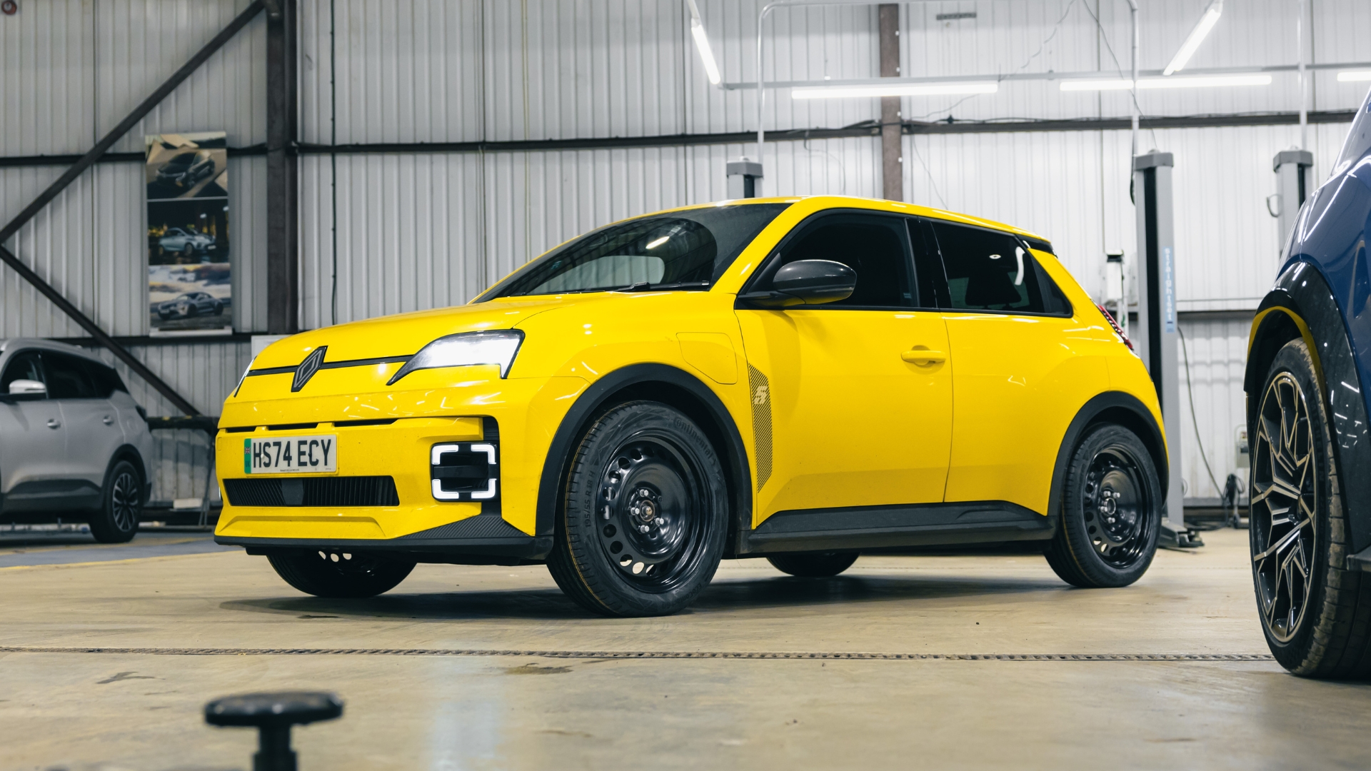 Renault 5 pictured from the side inside of a garage.