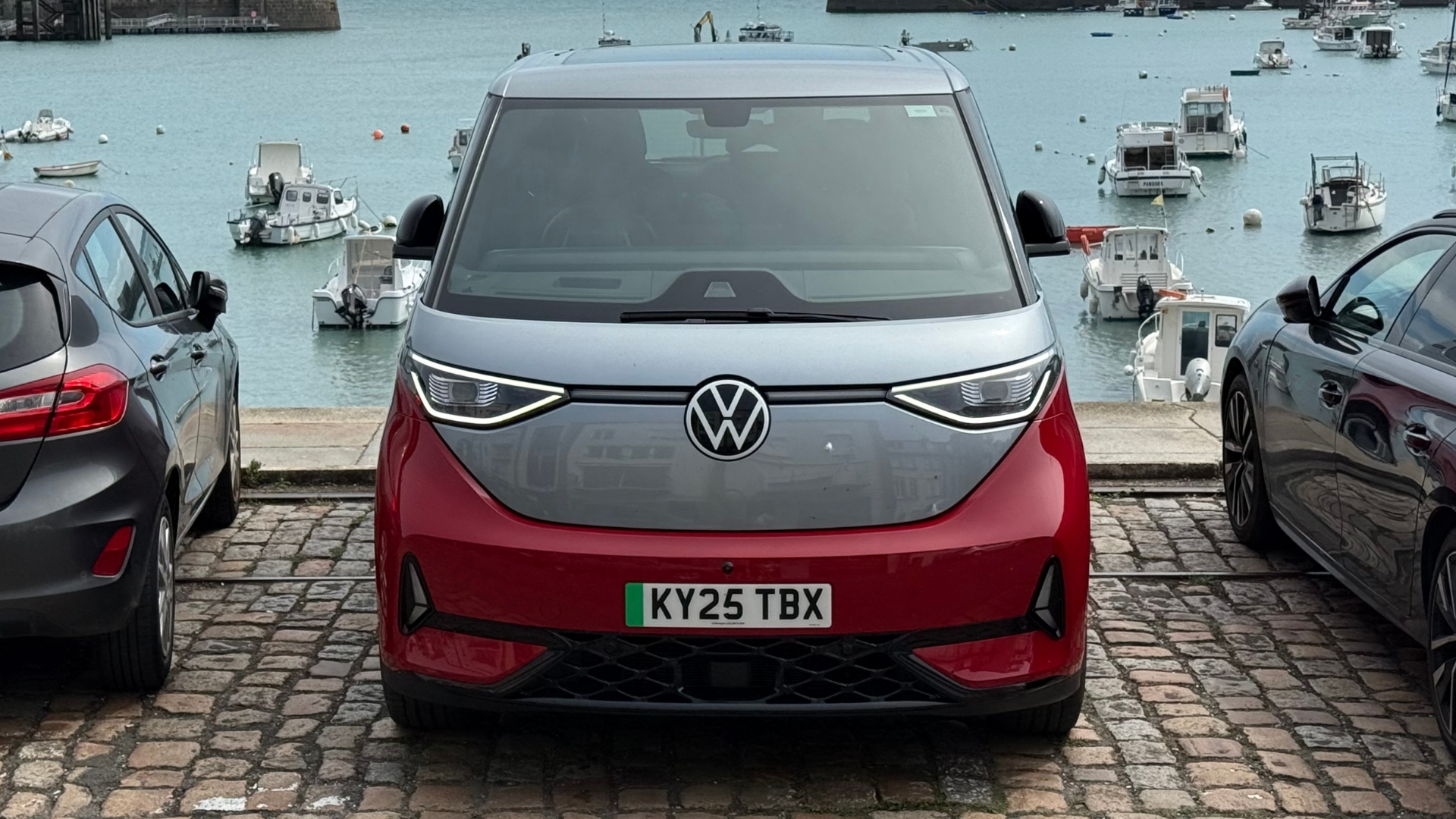 Volkswagen ID.Buzz parked next to the sea.