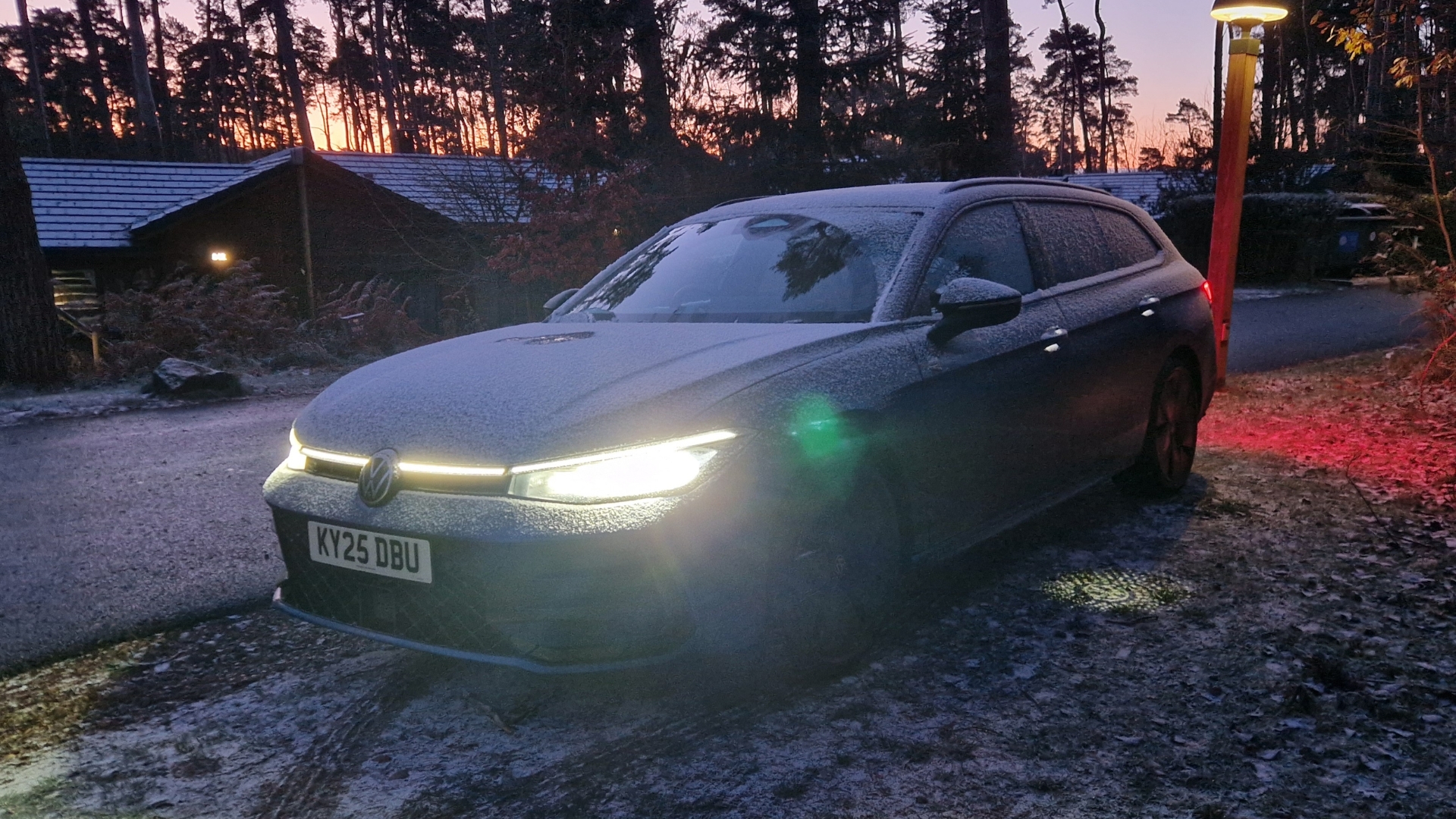 Volkswagen Passat Estate parked outside on a snowy evening