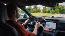 Porsche Cayenne Coupe Electric interior with driver