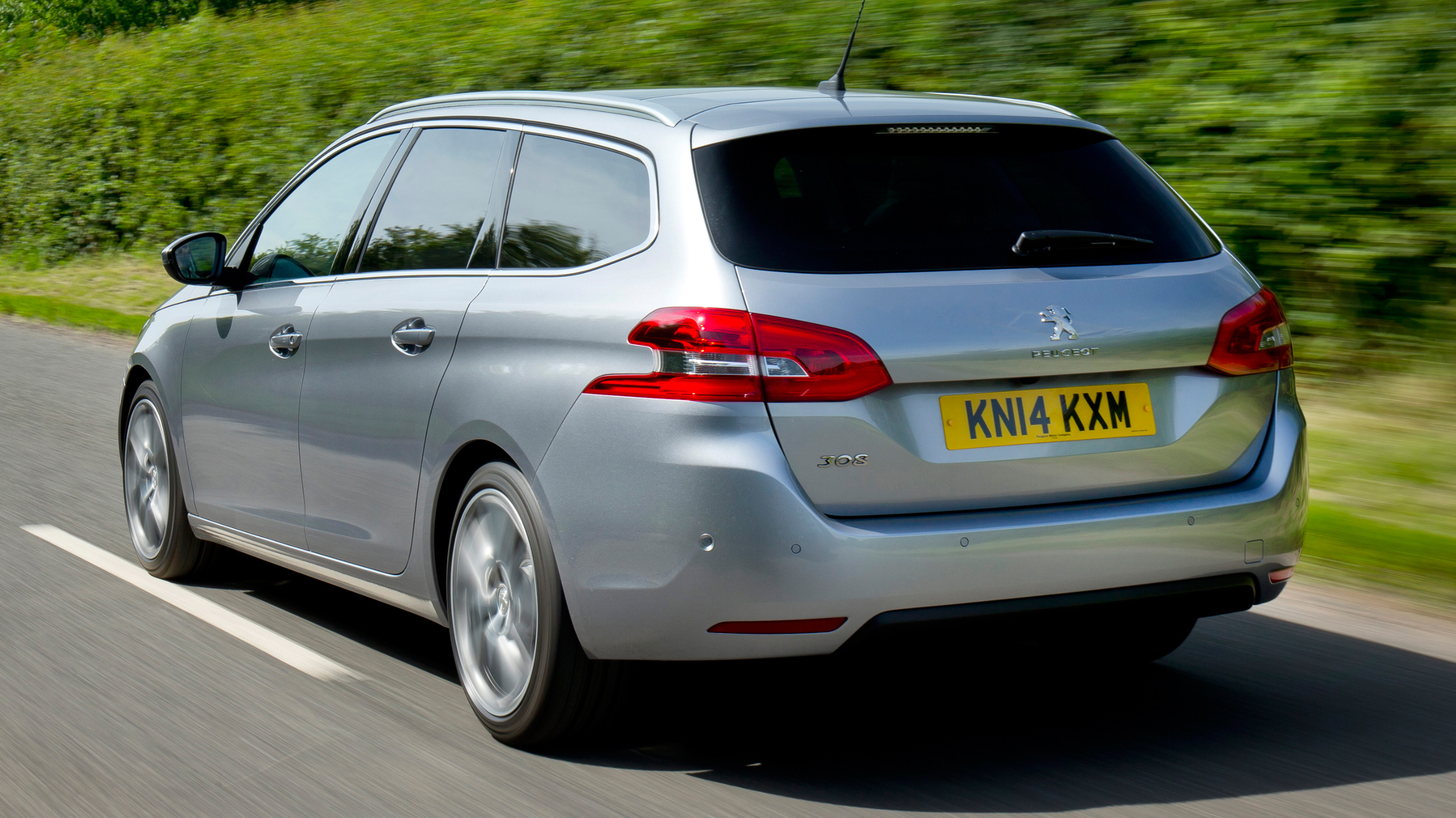 buyers_guide_-_peugeot_308_sw_2014_-_rear_quarter.jpg