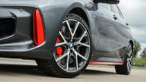 BMW 128ti alloy wheel and red decal