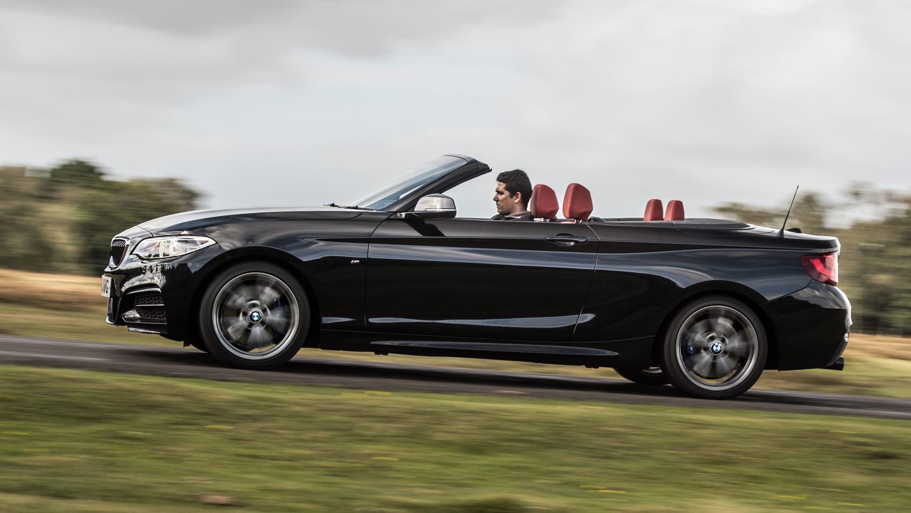 BMW M240i Convertible review: M2 torque in a soft-top Reviews 2026 ...