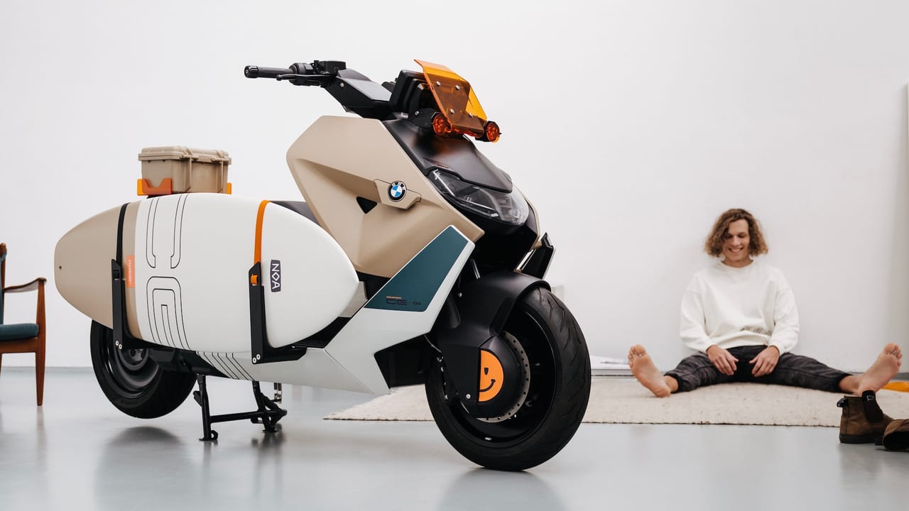 This is an electric BMW moped, customised to be beachready Top Gear