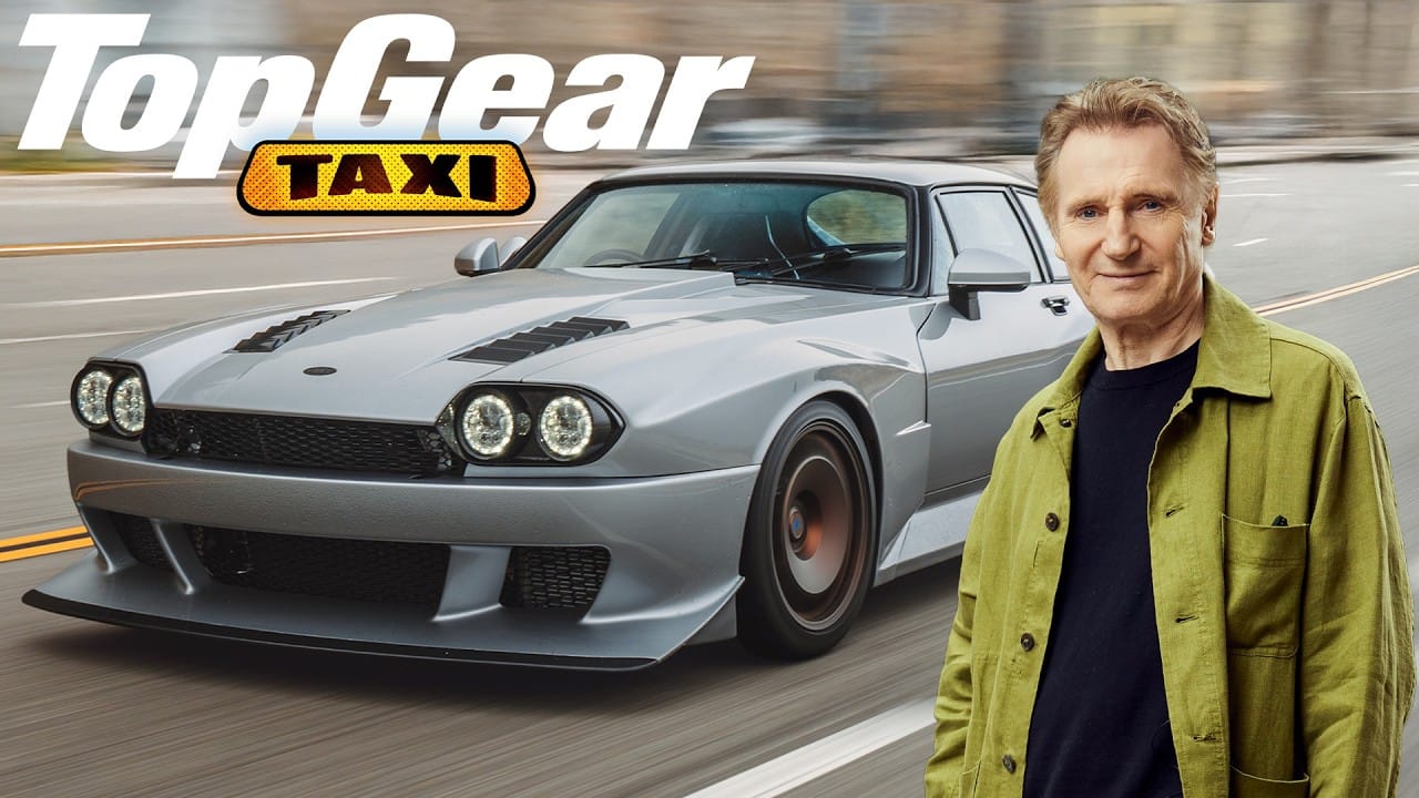 Liam Neeson driving the V12 TWR Supercat