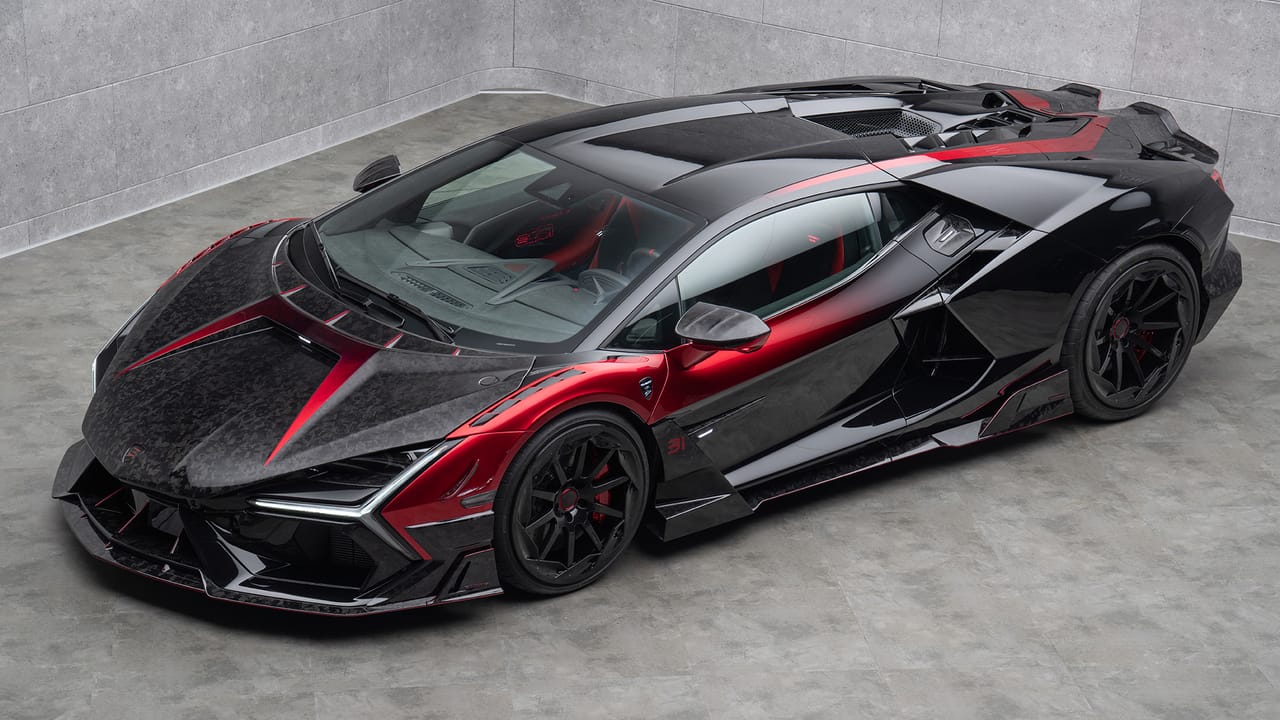 Esteban Ocon Mansory Revuelto delivery
